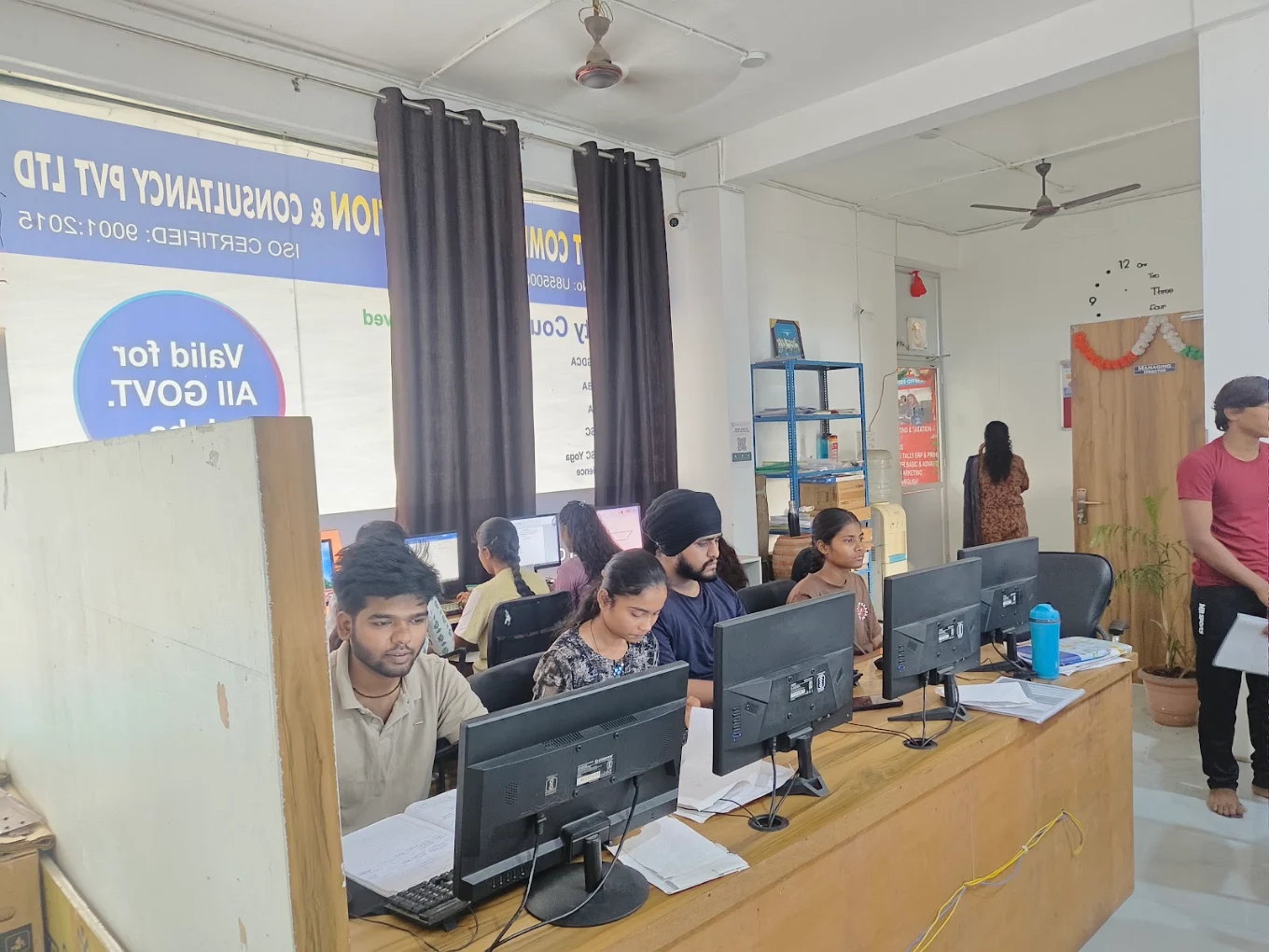 Students using computers at Best Computer